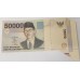INDONESIA 1999 . FIFTY THOUSAND 50,000 RUPIAH BANKNOTE . ERROR . MISCUT WITH FLAP